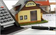 Picture of a house and calculator
