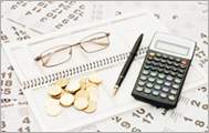 Illustration of money, glasses, a pen and a calculator sitting on top of a notebook