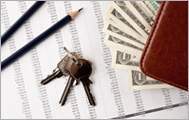 Picture of keys, pencils, and a wallet